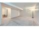 The basement features carpet flooring and neutral paint at 19357 E 40Th Ave, Denver, CO 80249