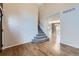 Entryway with wood floors, staircase and view into the dining room at 19357 E 40Th Ave, Denver, CO 80249