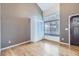 Light-filled living room with hardwood floors, built-in storage and window seat at 19357 E 40Th Ave, Denver, CO 80249