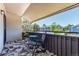 Cozy balcony with seating offers a relaxing outdoor space and views of the neighborhood at 2301 E Fremont Ave # W08, Centennial, CO 80122