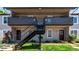 Apartment building exterior with black stairs and balcony at 2301 E Fremont Ave # W08, Centennial, CO 80122