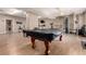 Game room has exercise equipment and a pool table at 2301 E Fremont Ave # W08, Centennial, CO 80122