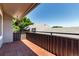 Exterior view of the brick patio with black metal railing at 2301 E Fremont Ave # W08, Centennial, CO 80122