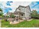 Spacious backyard featuring a patio with a pergola, outdoor dining area, and a built-in grill, ideal for outdoor entertaining at 5778 S Duquesne Ct, Aurora, CO 80016