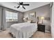 Cozy bedroom with a comfortable bed, soft carpeting, and ample natural light, creating a relaxing atmosphere at 5778 S Duquesne Ct, Aurora, CO 80016