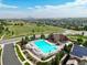 Aerial view of the community pool and clubhouse, offering residents a relaxing retreat at 5778 S Duquesne Ct, Aurora, CO 80016