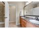 Bathroom featuring double sink and open view to shower at 4032 Donnington Cir, Castle Rock, CO 80104