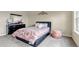 Bedroom features a comfortable bed and plenty of natural light at 4032 Donnington Cir, Castle Rock, CO 80104