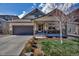 Inviting single-Gathering home with a covered porch, well-maintained lawn, and desirable curb appeal at 4032 Donnington Cir, Castle Rock, CO 80104