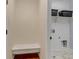 A mud room with built-in bench, storage, and tile flooring, offering convenience and organization at 4032 Donnington Cir, Castle Rock, CO 80104