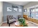 Bright sitting room featuring unique decor, a large window, and comfortable seating at 4032 Donnington Cir, Castle Rock, CO 80104