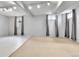 Unfinished basement space with recessed lighting, neutral carpet, and two windows at 7796 S Marshall Ct, Littleton, CO 80128