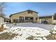 Backyard view showcasing the deck, shed, lawn and home's exterior at 1805 August Ln, Brighton, CO 80601