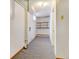 Functional utility room in the basement with built-in shelving at 1487 S Zeno Way, Aurora, CO 80017