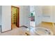 Bathroom vanity with view to outside deck and a walk in closet at 1487 S Zeno Way, Aurora, CO 80017