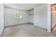 Bedroom includes neutral carpeting, closet and a window providing natural light at 1487 S Zeno Way, Aurora, CO 80017