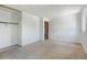 Bedroom includes neutral carpeting, closet and a window providing natural light at 1487 S Zeno Way, Aurora, CO 80017