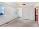 Bedroom features neutral carpet, and two windows providing abundant natural light at 1487 S Zeno Way, Aurora, CO 80017