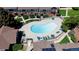 Aerial view of community pool and surrounding residences at 3825 S Monaco Pkwy # 111, Denver, CO 80237