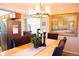 Dining room with chandelier and space for entertaining at 3825 S Monaco Pkwy # 111, Denver, CO 80237