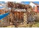 Backyard with arbor, wooden fence and hammock at 4508 W 34Th Ave, Denver, CO 80212