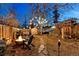 Relaxing backyard oasis with fire pit, hot tub, and string lights at 4508 W 34Th Ave, Denver, CO 80212