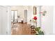 Elegant dining area with hardwood floors and a glass dining table at 4508 W 34Th Ave, Denver, CO 80212