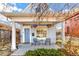 Charming front porch with hanging planters and seating at 4508 W 34Th Ave, Denver, CO 80212