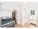 White archways lead from kitchen to dining and laundry at 4508 W 34Th Ave, Denver, CO 80212