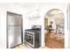 Updated kitchen featuring stainless steel appliances and white cabinetry at 4508 W 34Th Ave, Denver, CO 80212