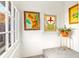 Bright landing with stained glass window and artwork at 4508 W 34Th Ave, Denver, CO 80212