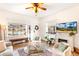 Charming living room with hardwood floors, fireplace, and decorative accents at 4508 W 34Th Ave, Denver, CO 80212