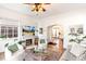 Bright and airy living room featuring hardwood floors and a fireplace at 4508 W 34Th Ave, Denver, CO 80212