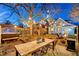 Spacious patio with wooden dining table, perfect for outdoor entertaining at 4508 W 34Th Ave, Denver, CO 80212