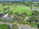 Expansive aerial view showcases property's large lot, outbuildings, and picturesque surroundings; close to city at 14650 Tejon St, Broomfield, CO 80023