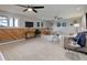 Finished basement featuring carpet flooring, a sofa, and two windows for plenty of natural light at 14650 Tejon St, Broomfield, CO 80023