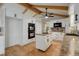 Modern kitchen with white cabinets, black appliances, and wooden countertops, providing a sleek and functional design at 14650 Tejon St, Broomfield, CO 80023