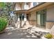 Exterior with a patio, perfect for outdoor living and enjoying the peaceful surroundings at 4800 E Cedar Ave, Denver, CO 80246