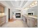 Bathroom with double vanity, tile floors, and a fireplace in the background at 4800 E Cedar Ave, Denver, CO 80246