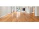 Living room with hardwood floors, fireplace and natural light from the windows at 4800 E Cedar Ave, Denver, CO 80246
