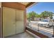 Balcony leading to the parking lot with a white car at 4100 Albion St # 611, Denver, CO 80216