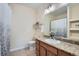 Bright bathroom featuring a granite countertop and neutral color palette at 4100 Albion St # 611, Denver, CO 80216