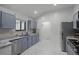 A closer look at the kitchen's stainless steel sink and modern faucet at 1061 S Yampa St # C, Aurora, CO 80017