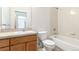 Bathroom features a vanity with solid surface countertop and a tub with shower at 7700 E 29Th Ave # 405, Denver, CO 80238