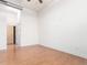Expansive living area featuring hardwood floors and neutral tones creating an open, versatile living space at 7700 E 29Th Ave # 405, Denver, CO 80238
