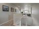 Upstairs hallway overlooking the living room at 11926 Olive St, Thornton, CO 80233