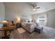 Cozy main bedroom features a tufted headboard and decorative pillows at 11926 Olive St, Thornton, CO 80233