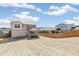 New home backyard featuring graded land, new fence and patio at 4451 Soapberry Pl, Castle Rock, CO 80108