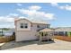 New home exterior with graded backyard, new fence and patio at 4451 Soapberry Pl, Castle Rock, CO 80108