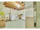 Basement with utility sink, appliances and laundry area offers practicality and functionality at 7101 Alan Dr, Denver, CO 80221